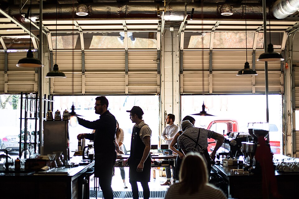 Baristas at work in a roastery